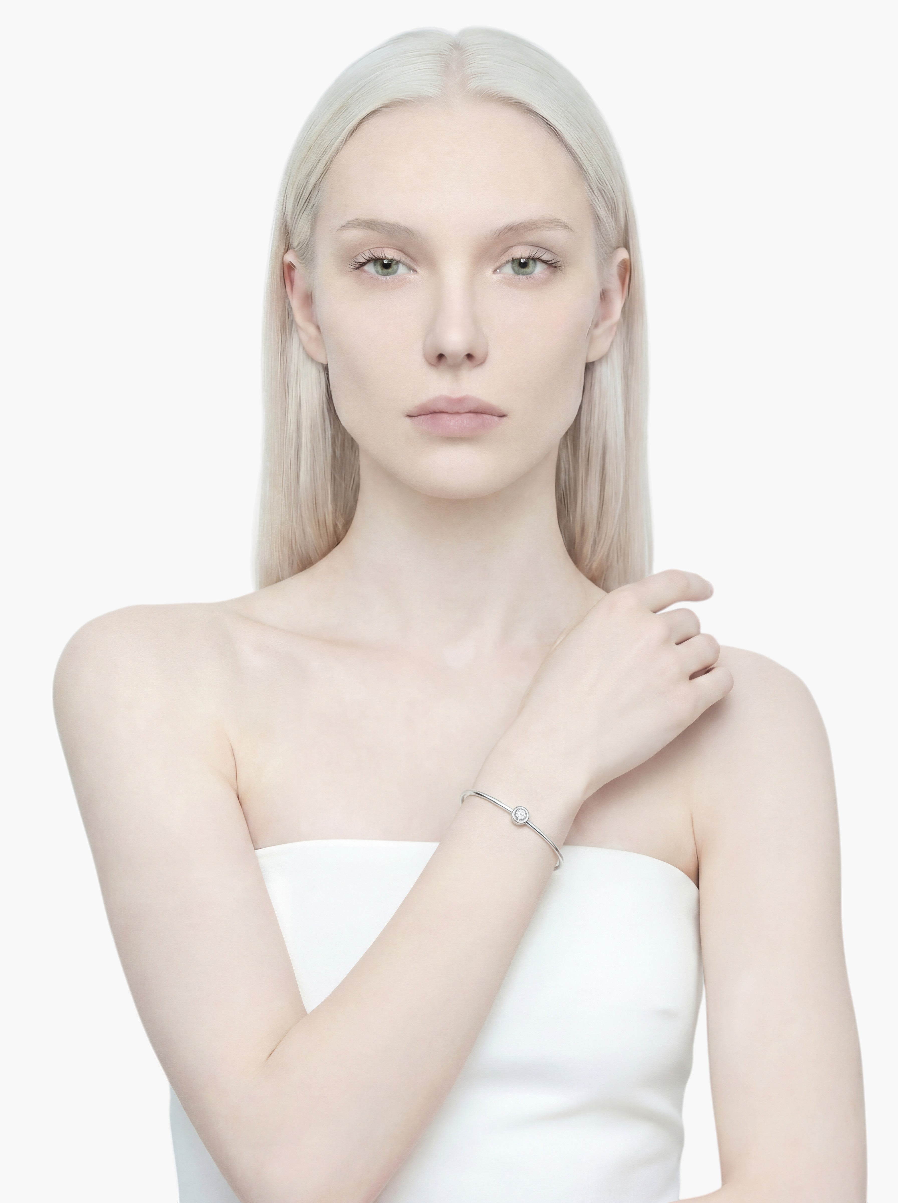 stem&stone sterling silver bangle with a single brilliant Moissanite stone, minimalist design.