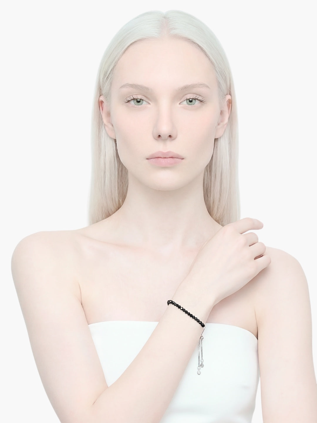 stem&stone adjustable bracelet of polished black obsidian beads with silver charms.